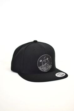 Silver Dinosaur Snapback Hat - Adventure Hat - Mountain Snapback Hat This black snapback hat features a large laser engraved faux leather patch with my hand drawn Dinosaur Space design. The design is engraved into black faux leather revealing a shimmery metallic silver finish. This patch is attached to the snapback with a strong waterproof fabric glue. Snapback style with a classic green under-bill. Adjustable Fitted Hat For Outdoor, Adjustable Flat Brim Fitted Hat For Outdoor, Outdoor Adjustable Fit Snapback Hat, Outdoor Adjustable Snapback Hat, Adjustable Snapback Fitted Hat For Outdoor, Adjustable Fit Snapback Hat For Outdoor, Adjustable Black Fitted Hat For Outdoor Activities, Adjustable Flat Brim Snapback Hat For Outdoor Activities, Adjustable Fit Snapback Hats For Outdoor Activities