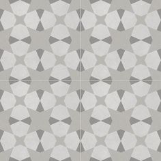 a white and gray tiled floor with different shapes