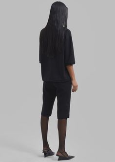 Color: Black Lightweight woven fabric Slim fit Knee length Back illusion welt pockets Concealed side zip closure Unlined 78% Polyester 18% Rayon 4% Elastane Machine Wash Cold By The Frankie Shop. Imported Side Zip, Welt Pocket, Woven Fabric, Knee Length, Slim Fit, Fabric, Black, Color