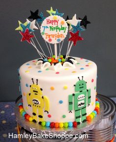 a birthday cake decorated with stars and decorations