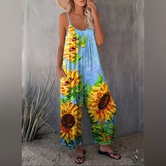 Boho Sunflower Print Sleeveless,Wide Leg, Comfortable Fit Jumpsuit Size: Various Sunflower Print Blue White Wide Leg Polyester Elastane Machine Wash New In Package Black Jumpsuit Outfit, Loose Fit Jumpsuit, Womens Jumpsuits Casual, Boho Jumpsuit, Pocket Jumpsuit, Floral Print Jumpsuit, Loose Jumpsuit, Print Jumpsuit, Jumpsuit Outfit