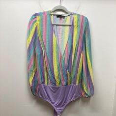 Nwt Eloquii Striped Multi-Colored Spring Fun Colors Plus Size Bodysuit. Deep V-Neck, Snaps At The Bottom. Balloon Sleeved. Gently Used With No Flaws, Size 20. See Photo For Approx. Measurements In Inches. 812 Chic Stretch Purple Bodysuit, Chic Purple Stretch Bodysuit, Chic Purple Bodysuit For Spring, Spring Multicolor V-neck Bodysuit, Multicolor Long Sleeve Bodysuit For Night Out, Purple Long Sleeve Bodysuit For Spring, Fitted Purple Bodysuit For Spring, Trendy Purple Bodysuit For Party, Trendy Purple Party Bodysuit