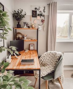 an instagram photo of a living room with plants on the table and other decorations