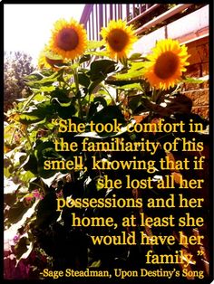 a sunflower in front of a building with a quote from the author on it