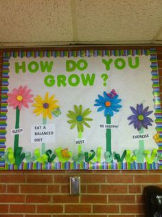 a bulletin board that says how do you grow? with flowers and words on it