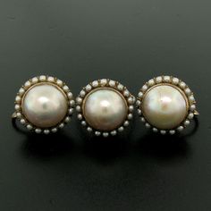 You are looking at a beautiful, antique, mabé pearl ring & earrings set. The set is crafted in solid 10k rose gold and it still has its original patina preserved which can be polished to like new if desired. The design shows the mabé pearl bezel set in the center of the setting surrounded with a prong set seed pearl bezel on all 3 pieces. We can sell you any piece individually if you desire. Enjoy! -- Item Details -- Material: 10k Solid Rose Gold Weight: 18.3 Grams -- Stone(s): (3) Natural G Victorian Pearl Earrings For Anniversary, Victorian Pearl Earrings For Wedding, Vintage Cabochon Pearl Ring For Wedding, Victorian Screw Back Wedding Jewelry, Victorian Jewelry With Pearl Pendant, Victorian Style Round Pearl Pendant Jewelry, Victorian Pearl Pendant Jewelry, Victorian Cabochon Jewelry For Wedding, Victorian Style Round Pearl Pendant