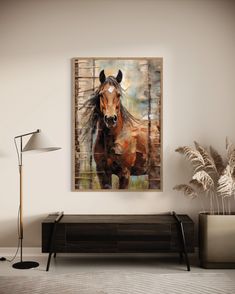 a painting of a horse is hanging on the wall