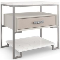 a white table with two drawers and a shelf underneath it that has a drawer on one side