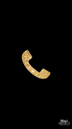 a gold phone on a black background with the letter c in it's center