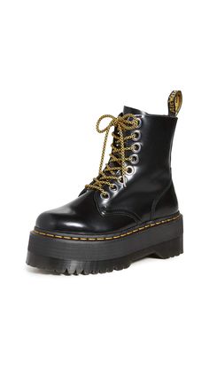 PRICES MAY VARY. Non-slip PVC AirWair sole Polished oversized grommets, Contrast welt stitching, Additional laces included Platform: 2.25in / 55mm Adjustable laces at top, zip closure at side Platform profile A high-shine take on a classic counter-culture shoe, these Dr. Martens boots add stand-out style to the brand's Jadon Max boots with a glossy, patent finish. Chunky Doc Martens, Dr Martens Jadon Max, Jadon Max, Dr Martens Jadon, Dr Martens Womens, Foot Injury, Max Black, Trending Boots, Goodyear Welt