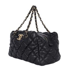 Authentic, pre-owned Chanel bubble quilted calfskin leather shoulder bag tote. Features black calfskin leather gold-tone hardware, dual leather woven straps, large CC at the front of the bag, and the interior lining has 3 compartments/pockets including a zippered compartment. Authenticity hologram stamp reads: 12899699 Made in Italy 2008-2009 Strap drop: 9" Bubble Quilt, Leather Formal Shoes, Leather Weaving, Bag Packaging, Formal Shoes, Quality Fashion, Leather Material, High Quality Leather, Chanel Classic