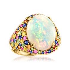 Ross-Simons - Ethiopian Opal, 2.20ct t. w. Multicolored Sapphire Ring in 14kt Yellow Gold. Size 9. The party never stops - at least not when this ring's on your finger! A 16x12mm oval Ethiopian opal cabochon beams its iridescent hues inside a flashy band bedazzled with 2.20 ct. t. w. multicolored sapphire rounds. Crafted in 14kt yellow gold. 3/4" wide. Multicolored sapphire and Ethiopian opal ring. Opal birthstones are the perfect gift for October birthdays. Elegant Multicolor Cabochon Opal Ring, Multicolor Oval Cabochon Opal Ring, Multicolor Oval Opal Ring For Formal Occasions, October Birthdays, Opal Birthstone, Ethiopian Opal Ring, Ring Opal, Sparkly Jewelry, Yellow Gold Jewelry