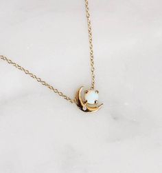 14K Opal & Diamond Moon Necklace In 18” length Celestial Crescent Jewelry With Birthstone, Celestial Moon Shaped Birthstone Jewelry, Celestial Moon-shaped Birthstone Jewelry, Celestial Crescent Gemstone Necklace, Celestial Opal Pendant Jewelry, Celestial Opal Round Necklace, Celestial White Opal Jewelry, Celestial Opal Necklace As A Gift, Celestial Opal Necklace As Gift