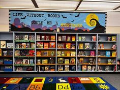 a library with bookshelves filled with children's books and an area rug that says life without books would be a nightmare