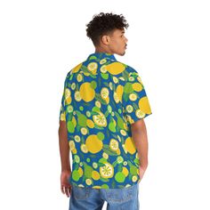 Nothing says "I love summer" like citrus prints on a Hawaiian shirt! Made to have a boxy fit and a notch lapel collar that are perfect for any laidback scenario, these shirts come with a handy chest pocket and a 95% polyester and 5% spandex fabric for silky comfort.  .: Material: 95% polyester, 5% spandex .: Medium fabric (7.23 oz/yd²(245 g/m .: Boxy fit .: Chest pocket .: Black or white button options Length, inches --S: 28.35M: 29.33L: 30.31XL: 31.302X: 32.283X: 33.274X: 34.255X: 35.24 Width, inches --S: 20.47M: 22.44L: 24.41XL: 26.382X: 28.353X: 30.314X: 32.285X: 34.25 Please be aware that this shirt is made to order, so there can be a small delay before it reaches you. Casual Camp Shirt With Graphic Print And Johnny Collar, Summer Collared Printed Shirt, Casual Cotton Hawaiian Shirt With Johnny Collar, Casual Hawaiian Shirt With Johnny Collar In Relaxed Fit, Summer Vacation Hawaiian Shirt With Johnny Collar, Casual Summer Shirt With Fruit Print, Casual Short Sleeve Shirt With Fruit Print, Retro Summer Shirt With Spread Collar, Casual Short Sleeve Collared Shirt For Vacation