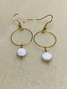 Lightweight Beatiful gold hoops with Mother of Pearl charm Gold Brass Hoop Earrings With Pearl Drop, Gold Dangle Hoop Earrings With Pearl Drop, Gold Hoop Earrings With Pearl Drop In Brass, Pearl Charms, Gold Hoops, Jewelry Earrings Hoops, Gold Hoop, Gold Hoop Earrings, Earrings Handmade