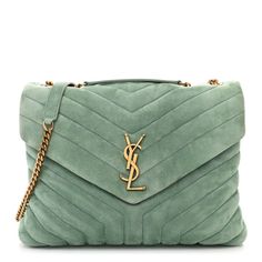 This is an authentic SAINT LAURENT Suede Y Quilted Monogram Medium Loulou Chain Satchel in Vert Opaline. This elegant shoulder bag is crafted of teal blue chevron-quilted suede. The bag features an aged gold chain-link shoulder strap with matching shoulder pads. The front flap has a prominent gold YSL monogram detail and opens to a partitioned fabric interior with zipper and patch pockets. Ysl Purse, Quilted Toys, Gold Sand, Blue Chevron, Saint Laurent Bag, Wallet Chain, Black Cross Body Bag, Chain Bags, Teal Blue