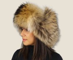 A fluffy hat that will always amaze by its beauty. A regal hat produced for warm-lovers and generally for those who want something majestical to bedeck their head with the most outstanding and massive way. An aviator style hat made with black napa sheepskin and extra heavy long-haired finn Raccoon skin. It has earflaps that can be adjusted to any high with leather straps that can be tied under the chin, on top of hat and at back of the head. Product description: 100% handmade product Natural mat Women Winter Hat, Fluffy Hat, Fur Trapper Hat, Fur Trapper, Back Of The Head, Trapper Hat, Trapper Hats, Aviator Style, Winter Hats For Women