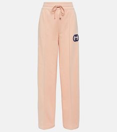 GG embroidered cotton jersey sweatpants in pink - Gucci | Mytheresa Gucci Casual Loungewear Bottoms, Casual Gucci Straight Leg Pants, Gucci Casual Straight Leg Pants, Gucci Wide Leg Pants For Spring, Gucci Wide-leg Pants For Spring, Gucci Casual Bottoms With Pockets, Casual Gucci Cotton Bottoms, Casual Gucci Bottoms With Pockets, Cotton Bottoms With Logo Detail And Relaxed Fit