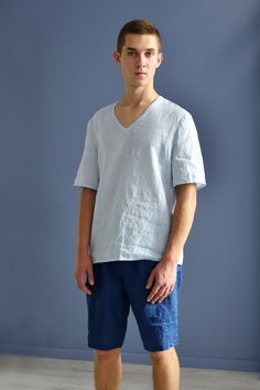 "Linen simple pajama set for summer in organic certified by OEKO-TEX standard 100 linen. Top short sleeved, v-neck, straight form. Top center back length - 27.5\" (70 cm). Shorts with elasticated waist and loose style. Shorts inside seam length - 11\" (28 cm). Pajama linen quality - washed and softened and should not shrink any more. On picture S size model wears article in dark navy/milky white/natural undyed linen size S. Other colors of item please find here: www.etsy.com/listing/538806706/li Affordable Casual Men's Sleepwear, Light Blue Cotton Relaxed Fit Sleepwear, Light Blue Cotton Sleepwear With Relaxed Fit, Light Blue Relaxed Fit Sleepwear For Summer, Light Blue Short Sleeve Summer Sleepwear, Light Blue Relaxed Fit Casual Sleepwear, Casual Light Blue Relaxed Fit Sleepwear, Casual Summer Sleep Tops, Casual Light Blue Linen Tops