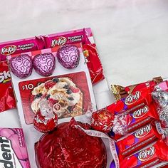 valentine's day treats and candy laid out on a table