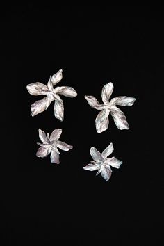 These earrings are a holiday must. These oversize studs will have your outfit in full bloom. Available in both gold and silver Chic Silver Flower Earrings For Pierced Ears, Chic Silver Flower Earrings, Chic Silver Flower Jewelry, Chic Silver Flower Earrings As Gift, Chic Silver Flower Earrings For Gift, Poinsettia Earrings, Lily Earrings, Floral Hoops, Floral Jewelry