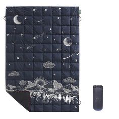 an image of a sleeping bag and blanket with stars, planets and the moon on it