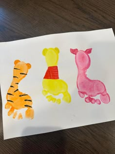 a child's drawing of winnie the pooh, tigger and tiger on paper