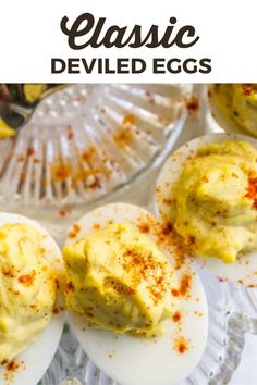 deviled eggs on a glass plate with the words classic deviled eggs