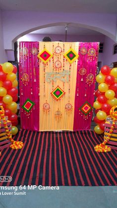 an entrance decorated with balloons and decorations