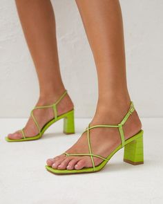 This item is Final Sale Bold and vibrant colored accessories are our latest obsession. Make a neutral 'fit an eye catching one with the Ilaia Croc Strappy Sandal in Acid. This bright green colored block heel sandal makes for an easy and effortless... Colorful Block Heels, Latest Obsession, Strappy Block Heels, Flip Flops Style, Shoe Fits, Low Block Heels, Heel Sandal, 5 Inch Heels, Summer Accessories