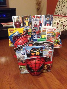 a bunch of toys sitting on top of a hard wood floor next to a tv