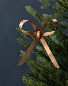 a close up of a ribbon on a christmas tree