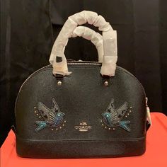 Coach Sierra Bird Bag. Bnwt. Black With Beads And Stud Bird Accents. Includes Should Strap Too! Everything In Its Original Untouched Packaging. Gorgeous Bag!! Designer Embellished Black Bags, Black Embellished Top Handle Bag, Designer Black Embellished Bags, Black Embellished Handheld Shoulder Bag, Designer Black Embellished Shoulder Bag, Embellished Travel Bags, Black Coach Bags For Party, Coach Sierra, Ethiopian Opal Ring