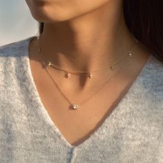 This dainty necklace features nine tiny crystal Crosses hanging from on a Rolo chain. Pair it with other necklaces from our O collection. Our patented connectors let you easily link and layer necklaces in any order you desire. Each Cross Height 5mm Adjustable chain: 15-18in (38-46cm) When layered, chain length is: 15-21in (38-53cm) Learn more Gold Vermeil Spring clasp closure Hypoallergenic, lead and nickel free #187G Cross Necklace Layering, Comfort Necklace, 2023 Birthday, Layer Necklaces, Jewerly Set, Dainty Choker Necklace, Dangle Necklace, Tiny Cross, Layered Chain