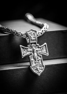 Show off your faith with this luxurious silver orthodox cross. Crafted from gleaming silver and featuring intricate detailing, this is a divinely stylish piece of jewelry that will add a touch of elegance to any outfit. Wear with pride and inspiration. Sterling silver Pendant: 64 x 38 mm Bail: 14 x 8.7 mm Please note: pendant only; chain sold separately Shown with: HEAVY SILVER BALI NECKLACE (7 MM) Handcrafted Silver Cross Processing time 1-3 business days Luxury White Gold Cross Necklace, Luxury Cross Pendant Necklace, Luxury Silver Crucifix Necklace, Luxury Silver Sterling Silver Cross Necklace, Luxury Engraved Cross Jewelry, Luxury Sterling Silver Cross Necklace In Silver, Silver Byzantine Cross Jewelry, Byzantine Cross Sterling Silver Jewelry, Silver Crucifix Necklace With Polished Finish