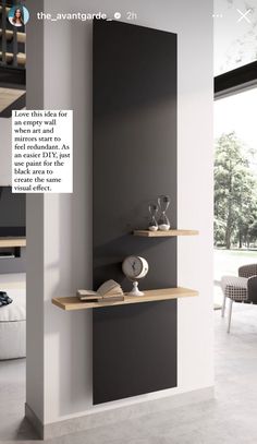 two shelves with books on them in a living room next to a wall mounted clock