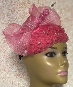 Pink Fascinator Half Hat for Church head covering, Tea Party, Wedding, and other Special Occasions  Accented with rhinestones, hat pin, and bow pearl. The hat pin may vary and is for decorative purposes only. The hat is affixed to the head via a hat string. Measures:  10 X 7 inches Handmade Gifts for mom, sister, wife, or yourself. SHIPPING  All items for free shipping will be shipped via USPS FIRST CLASS MAIL. Handmade Gifts For Mom, Tee Party, Pink Fascinator, Tea Party Wedding, Sister Wife, Hat Pin, Hat Pins, Head Covering, First Class