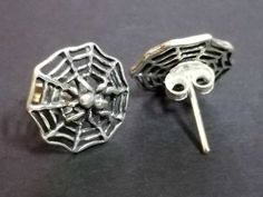 This listing is for one pair of earrings (2 pc) Spiderwebs with spiders gothic earrings. Great for Halloween or Gothic attire. Sterling Silver. Shipped from California. No returns on earrings. Gothic Round Earrings As Gift, Gothic Halloween Plug Earrings As A Gift, Halloween Plug Earrings As Gift, Gothic Sterling Silver Plug Earrings As Gift, Silver Pierced Earrings For Halloween, Silver Earrings For Halloween Gift, Silver Ear Wire Earrings For Halloween, Silver Gothic Round Earrings, Gothic Plug Earrings For Halloween Gift