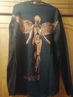 How to Create Stunning Bleach Clothes Designs at Home Bleach Painting Sweatshirt, Bleached Tshirt Ideas Grunge, In Utero Shirt, Bleach Painting, Nirvana In Utero, Vintage Nirvana, Bleach Dye Shirts