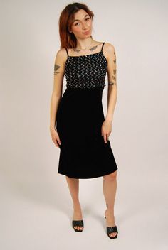 * Size: Best fits XS / Small * Vintage 90s cocktail dress by Amanda Rose. * A real statement piece : ) Black velvet midi slip dress with sequin mesh top, spaghetti straps, and back zipper. Ties in back. * Excellent vintage condition. No stains or holes. * Material: Velvet and likely nylon under sequin mesh. - MEASUREMENTS - CHEST (doubled) 27" WAIST (doubled) 24" HIPS (doubled) 26" LENGTH (top of shoulder to bottom of garment) 42" ---- FEEL FREE TO MAKE A REASONABLE OFFER ON ANY ITEM ~ Returns accepted on all items ~ ~ Ask about discounts on multiple item orders ~ Sequin Mesh Top, Amanda Rose, Midi Slip Dress, Black Slip Ons, Velvet Dress, Dresses Xs, Dress Clothes For Women, Spaghetti Strap, Slip Dress