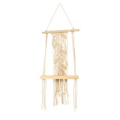 a macrame hanging from a wooden frame