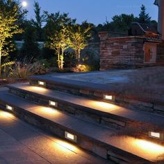 some steps lit up with lights in the evening