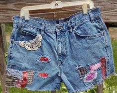 Upcycled Jean Shorts Cutoffs Boho Festive Hippie Shabby Chic Embroidery Patches Patchwork - Etsy Shabby Chic Embroidery, Chic Embroidery, Mending Clothes, Boho Jeans, The Rachel, Upcycle Jeans, Flowers Handmade, Distressed Shorts, Levi Shorts