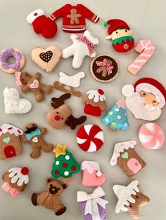 many different types of felt toys are arranged in the shape of a christmas ornament