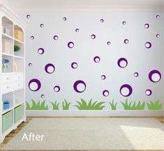 this is an image of a child's room with purple bubbles on the wall