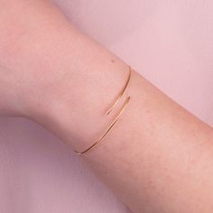 This trendy bracelet will bring a minimalist, modern, and fashionable touch to your look.Elegant and simple is a favorite piece and so easy to stack with other bracelets and bangles.Explore our collection of moden and classic bracelets for all the occasions. Home Page: https://www.etsy.com/shop/ByGema ♥♥Jewelry Certification Guarantee carats of products ♥♥ MATERIALS This piece of my Jewels Collection is made of 9 carats, 14 carats or 18 carats solid gold upon request. We like to use yellow gold, Adjustable Yellow Gold Bracelets With Simple Design, Adjustable Yellow Gold Bracelet With Simple Design, Minimalist Adjustable Yellow Gold Bracelets, Adjustable Minimalist Yellow Gold Bracelets, Minimalist Adjustable Yellow Gold Bracelet, Flexible 14k Gold Minimalist Bracelets, Minimalist Flexible 14k Gold Bracelets, Minimalist 14k Gold Flexible Bracelets, Minimalist Adjustable Gold Bracelet For Formal Occasions