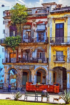 an old building with many balconies on it