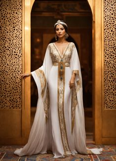 Lexica - Beautiful morrocan women wearing kaftan white , haute couture, klimt art inspiration , luxury, full body, hyperrealistic, White Haute Couture, Egypt Inspiration, Egyptian Inspired Fashion, Egyptian Dress, Kaftan Style Dresses, Egyptian Fashion, Klimt Art, Egyptian Women