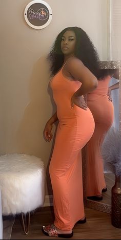 Peach colored fitting maxi dress Orange Elegant Stretch Maxi Dress, Apricot Fitted Maxi Dress For Party, Fitted Apricot Maxi Dress For Party, Elegant Orange Stretch Maxi Dress, Fitted Sleeveless Apricot Maxi Dress, Elegant Stretch Orange Maxi Dress, Spring Stretch Maxi Dress, Spring Full-length Bodycon Dress, Bodycon Full-length Dress For Spring